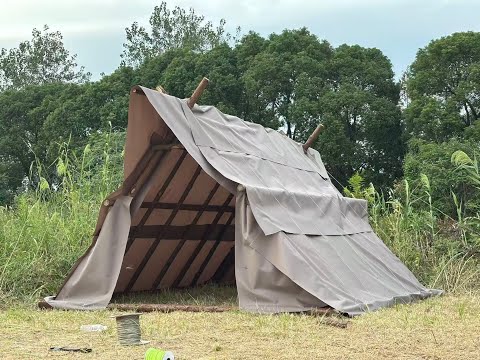 The completed cabin in the rain
